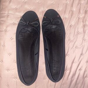 Black flats with bow detail